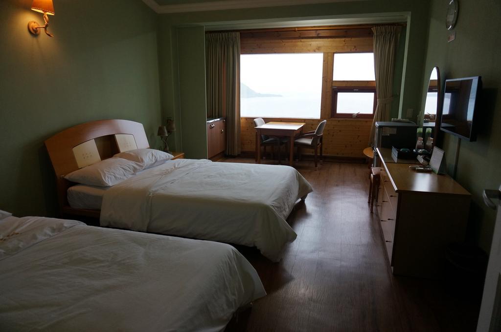 Park Beach Hotel Jeju Quarto foto